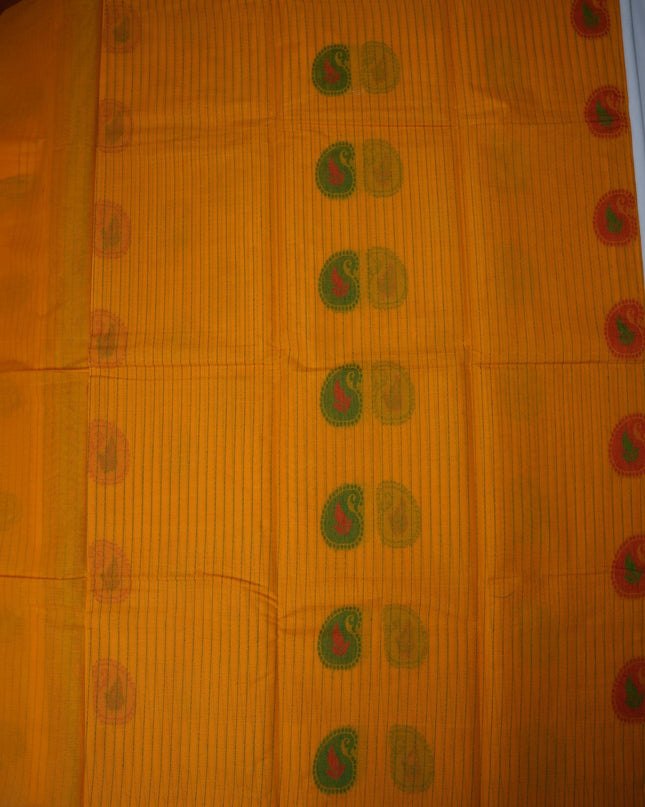 Bhavana Handlooms mustard yellow Coimbatore handloom saree featuring traditional paisley motifs and maroon border