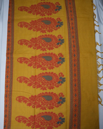 Bhavana Handlooms mustard yellow Coimbatore handloom saree featuring traditional orange paisley motifs and maroon border