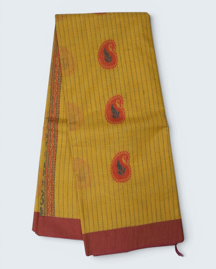Bhavana Handlooms mustard yellow Coimbatore handloom saree with traditional paisley motifs and a rust woven border.
