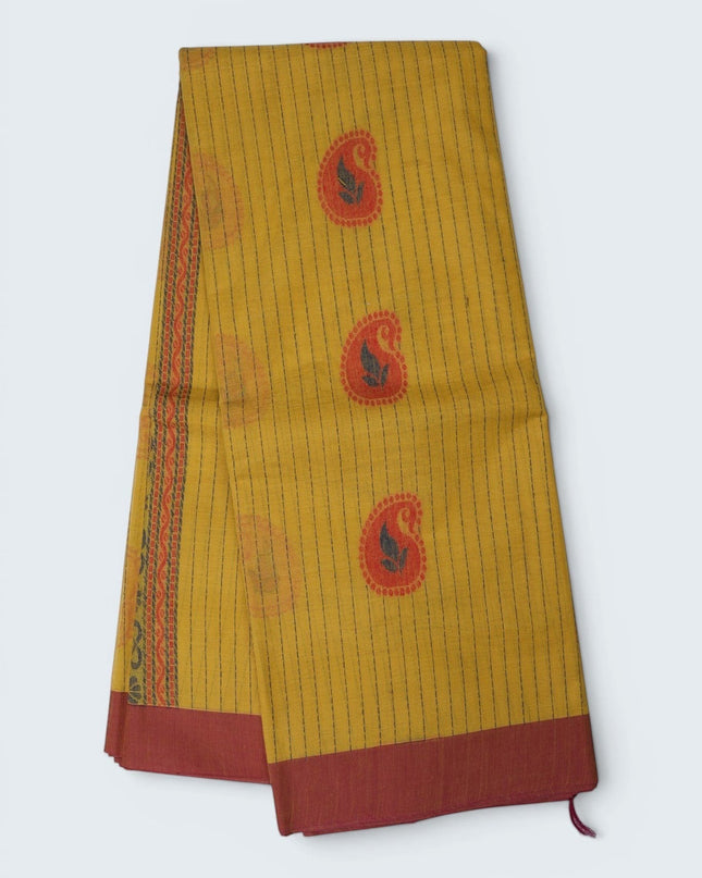 Bhavana Handlooms mustard yellow Coimbatore handloom saree with traditional paisley motifs and a rust woven border.