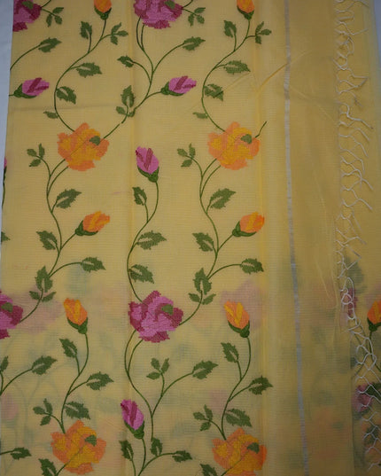 Bhavana Handlooms mustard yellow silk Kota saree featuring all-over floral embroidery and a delicate woven border.