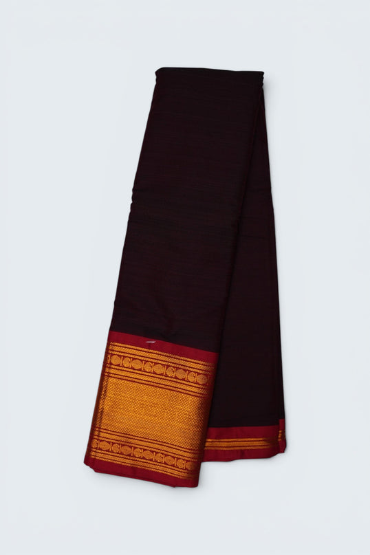 Bhavana Handlooms Narayanapet Mercerized Cotton Saree in wine maroon with gold zari border. Lightweight and soft finish.