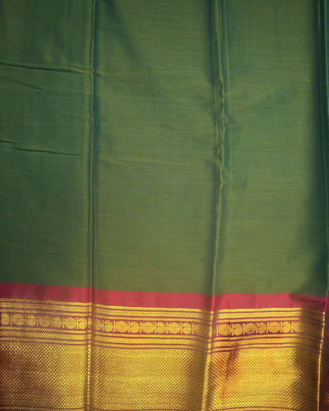 Bhavana Handlooms Narayanapet mercerized cotton saree in olive green with a rich gold zari border and pink trim. Lightweight and soft finish.