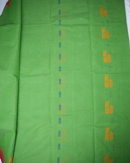 Bhavana Handlooms parrot green Coimbatore handloom saree with floral butta motifs and a contrast rani pink zari border