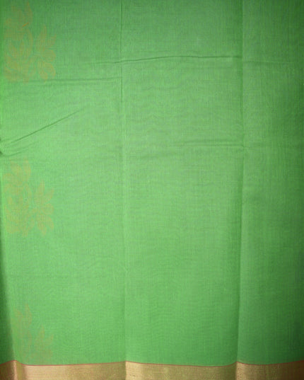Bhavana Handlooms parrot green Coimbatore handloom saree with floral butta motifs and a contrast rani pink zari border