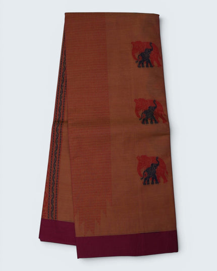 Bhavana Handlooms peach orange Coimbatore handloom saree with traditional elephant motifs and contrast rani pink border