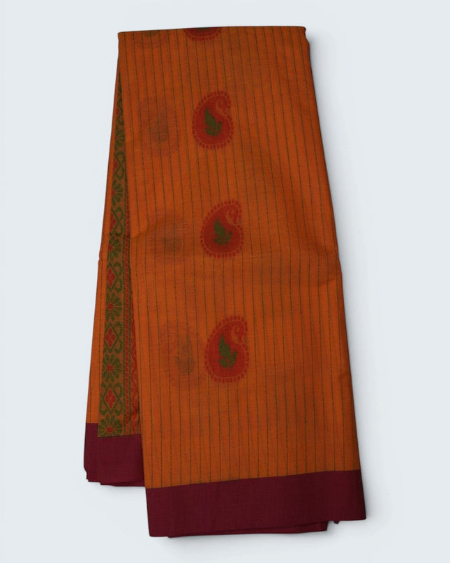 Bhavana Handlooms peach orange Coimbatore handloom saree with traditional paisley motifs and contrast rani pink border