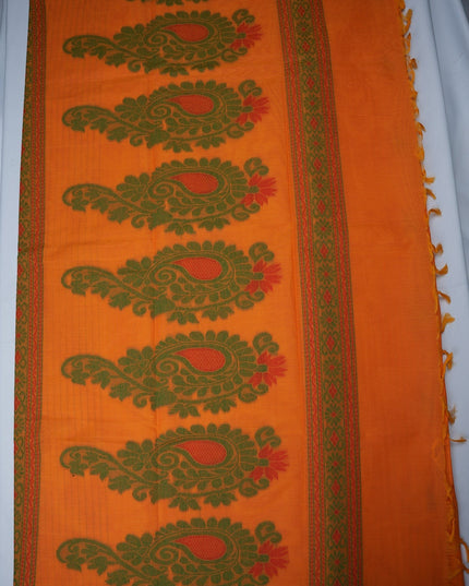 Bhavana Handlooms peach orange handloom saree featuring green paisley motifs and a contrast rani pink woven border.