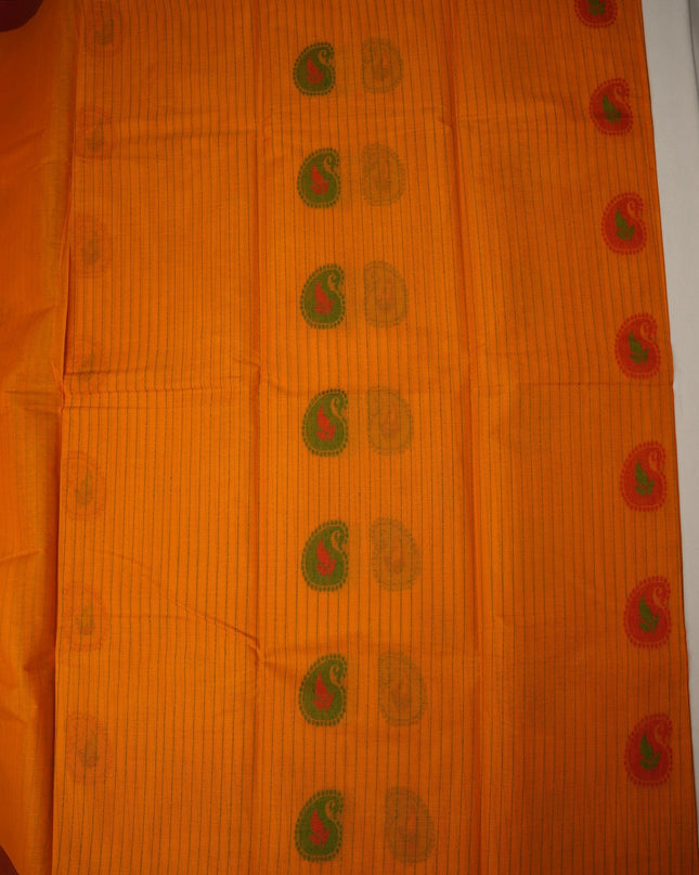 Bhavana Handlooms peach orange handloom saree featuring traditional green paisley motifs and a contrast maroon border.