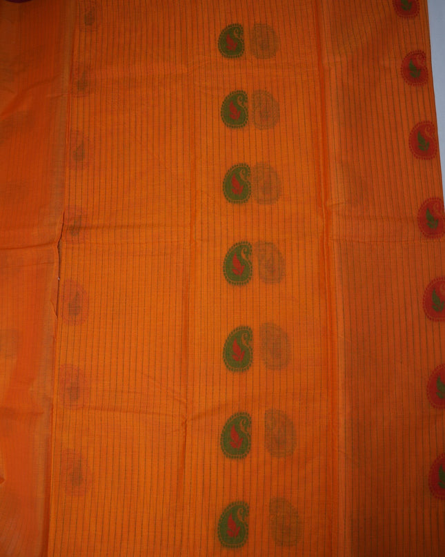 Bhavana Handlooms peach orange Coimbatore handloom saree with green paisley motifs and a contrast rani pink border.