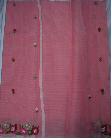 Bhavana Handlooms baby pink silk Kota saree featuring delicate floral embroidery motifs and an elegant silver border.