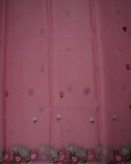 Bhavana Handlooms baby pink silk Kota saree featuring delicate floral embroidery motifs and an elegant silver border.