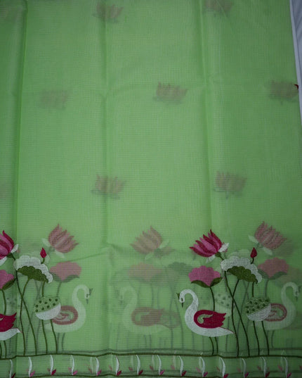 Bhavana Handlooms pista green silk kota saree featuring delicate swan and lotus embroidery with an elegant border.