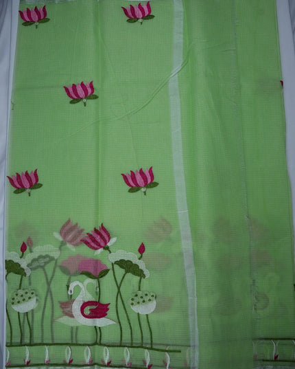 Bhavana Handlooms pista green silk kota saree featuring pink lotus and white swan embroidery with an elegant border
