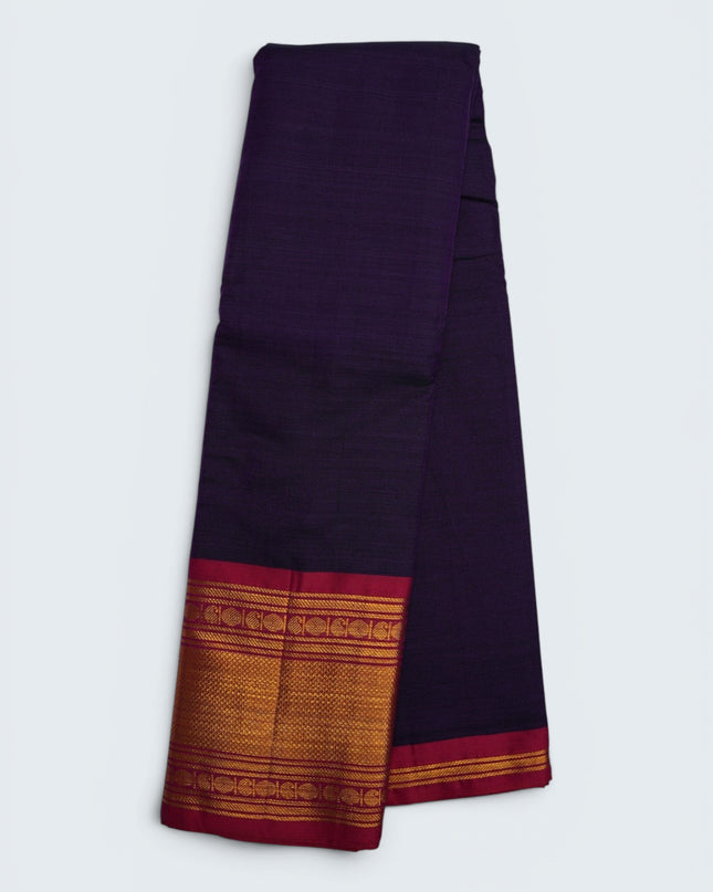 Bhavana Handlooms deep royal purple mercerized cotton saree with gold border and red trim. Lightweight, soft finish.