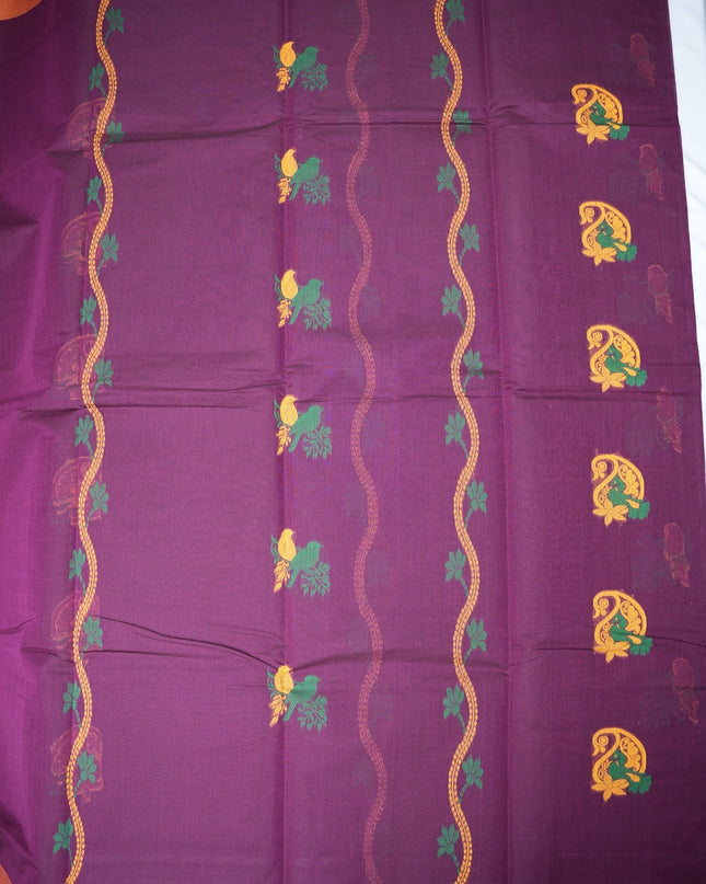 Bhavana Handlooms deep purple Coimbatore handloom saree featuring traditional bird motifs and a mustard woven border.
