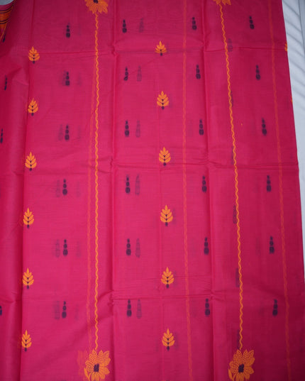 Bhavana Handlooms Coimbatore handloom saree in rani pink with yellow floral butta motifs and traditional border