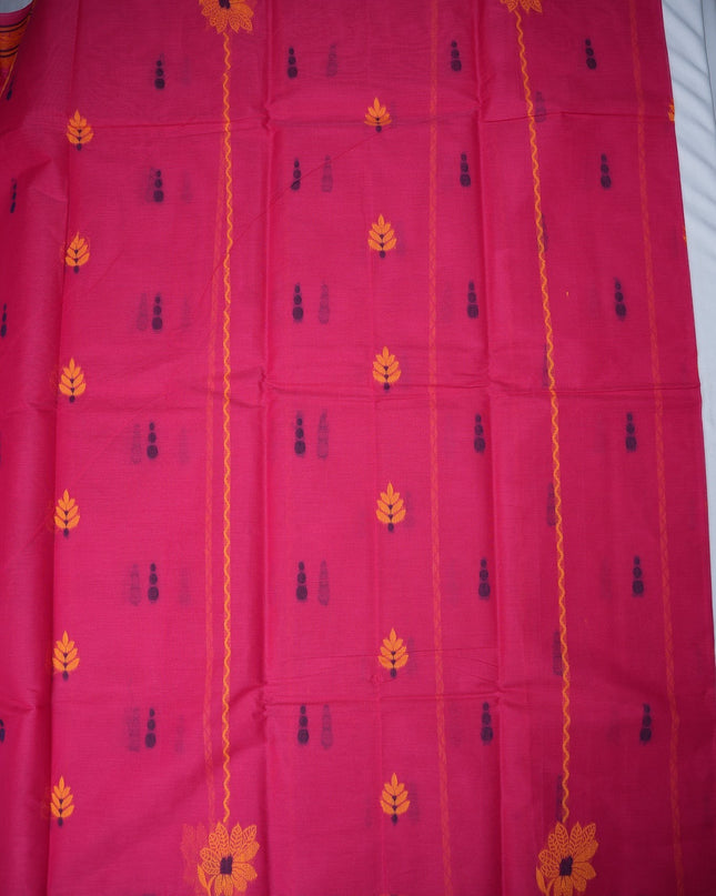 Bhavana Handlooms Coimbatore handloom saree in rani pink with yellow floral butta motifs and traditional border