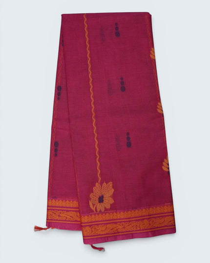 Bhavana Handlooms Coimbatore handloom saree in rani pink with traditional orange floral butta motifs and woven border