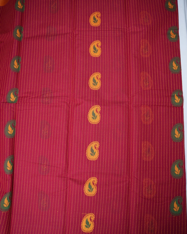 Bhavana Handlooms rani pink handloom saree featuring vertical stripes, paisley motifs, and a peach orange border.