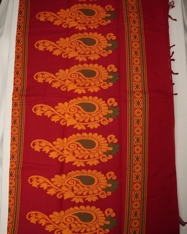 Bhavana Handlooms tomato red Coimbatore handloom saree featuring large golden yellow paisley motifs and peach orange border