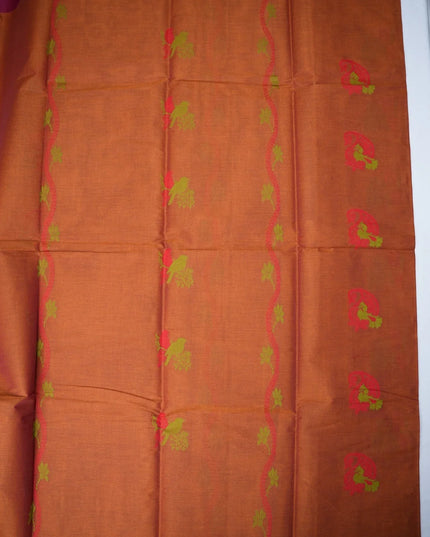 Bhavana Handlooms rust orange Coimbatore handloom saree featuring traditional bird motifs and a magenta woven border
