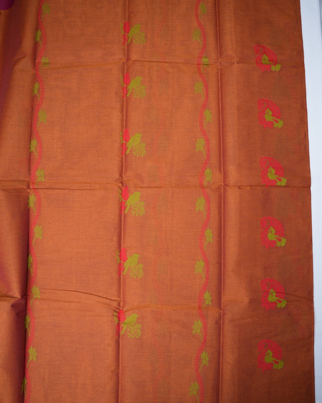 Bhavana Handlooms rust orange Coimbatore handloom saree featuring traditional bird motifs and a magenta woven border