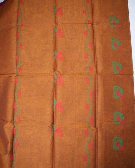 Bhavana Handlooms rust orange Coimbatore handloom saree featuring traditional bird motifs and a magenta woven border.