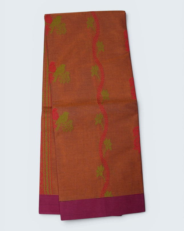 Bhavana Handlooms rust orange Coimbatore handloom saree with green bird motifs and a contrast magenta woven border.