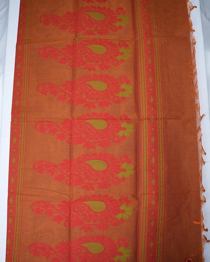 Bhavana Handlooms rust orange Coimbatore handloom saree featuring traditional bird motifs and a magenta woven border.