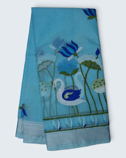 Bhavana Handlooms sky blue silk Kota saree featuring intricate swan and lotus embroidery and an elegant border.