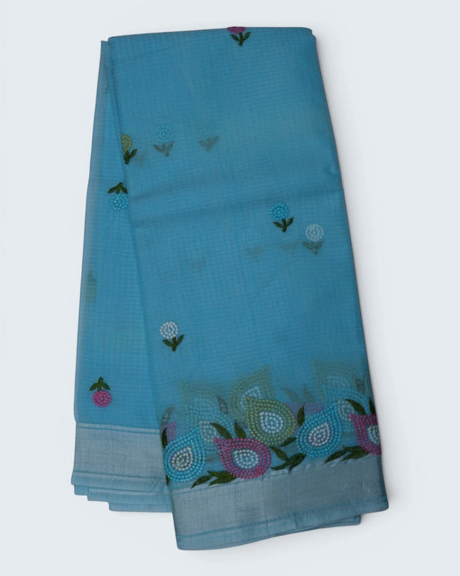 Bhavana Handlooms sky blue silk kota saree featuring delicate floral embroidery motifs and a multicolor designer border