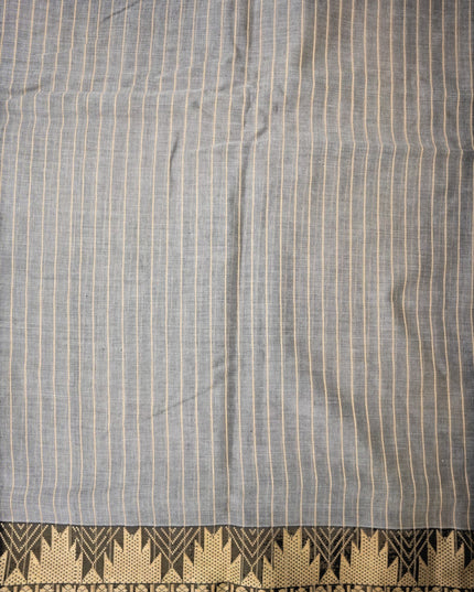 Bhavana Handlooms steel grey mercerized cotton saree with thin cream stripes and a traditional geometric border. Lightweight and soft finish.
