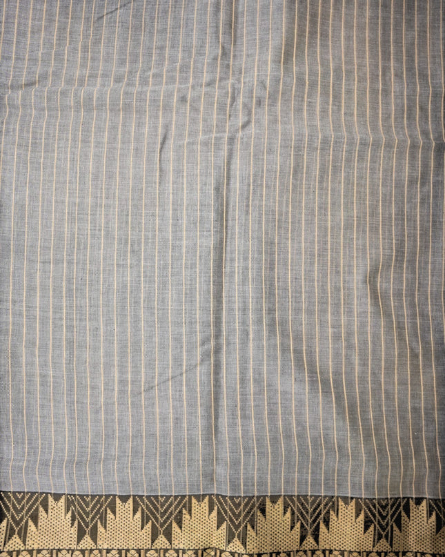 Bhavana Handlooms steel grey mercerized cotton saree with thin cream stripes and a traditional geometric border. Lightweight and soft finish.