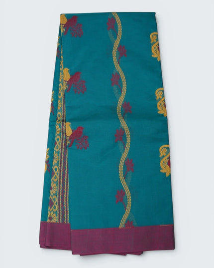 Bhavana Handlooms teal blue Coimbatore handloom saree featuring traditional bird motifs and a contrast woven border