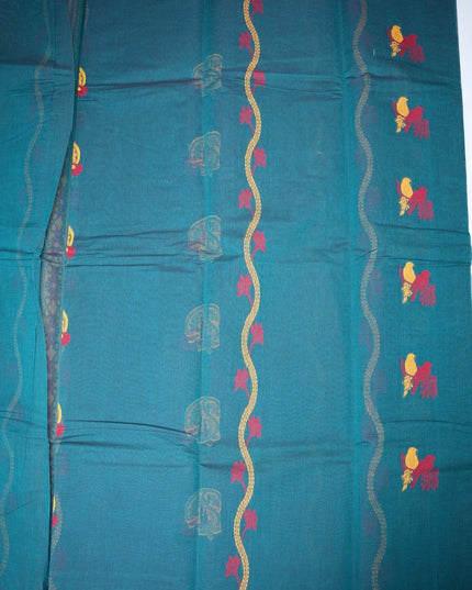 Bhavana Handlooms teal blue Coimbatore handloom saree featuring traditional bird motifs and a mustard woven border.