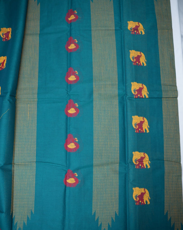 Bhavana Handlooms teal blue Coimbatore handloom saree featuring traditional elephant motifs and a contrast rani pink border