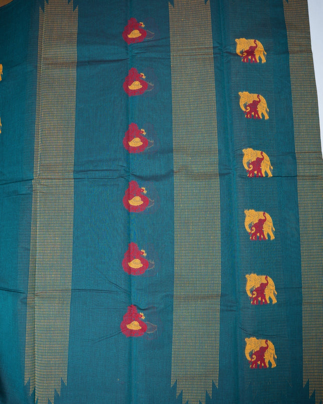 Bhavana Handlooms teal blue Coimbatore handloom saree featuring traditional elephant motifs and mustard gold borders.