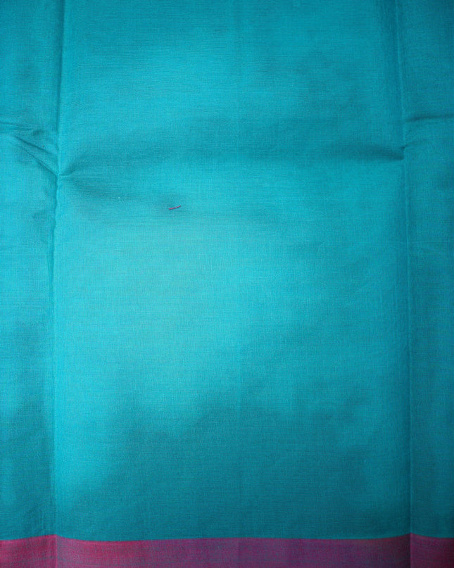 Bhavana Handlooms teal blue Coimbatore handloom saree featuring a contrasting pink woven border and bird motifs.