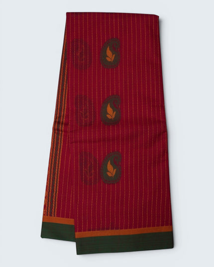 Bhavana Handlooms tomato red Coimbatore handloom saree featuring vertical stripes, paisley motifs, and a green border.