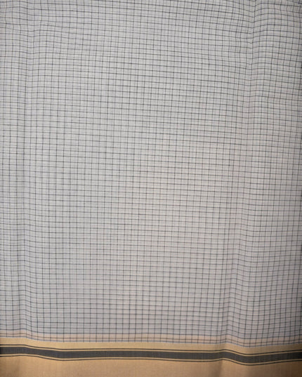 Bhavana Handlooms elegant white and black checked mercerized cotton saree with a traditional gold and black border. Lightweight drape.
