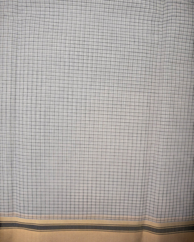 Bhavana Handlooms elegant white and black checked mercerized cotton saree with a traditional gold and black border. Lightweight drape.