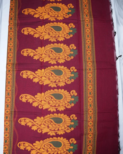 Bhavana Handlooms wine purple Coimbatore handloom saree featuring traditional woven bird motifs and a rust border.