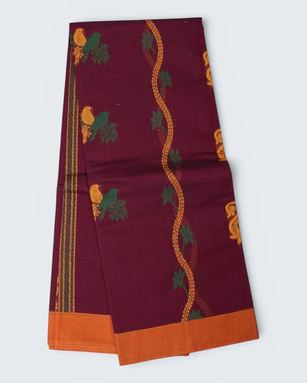 Bhavana Handlooms wine purple Coimbatore handloom saree featuring traditional bird motifs and a contrast rust border.