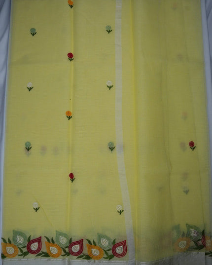 Bhavana Handlooms lemon yellow silk Kota saree featuring delicate floral embroidery motifs and a multicolor border.